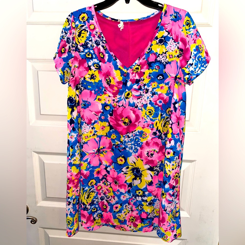 Buddy Love brand women’s dress size medium Bright Florals and very colorful!